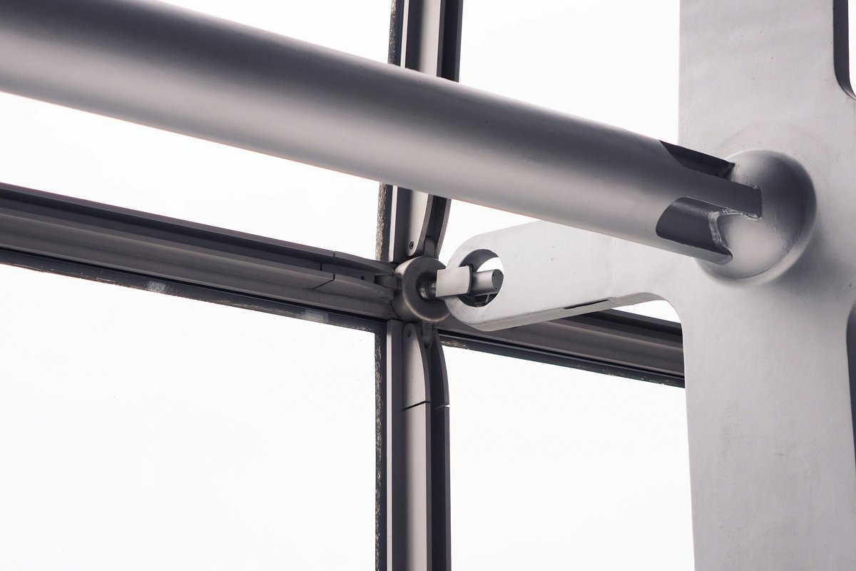 A close up of a metal bar on a wall