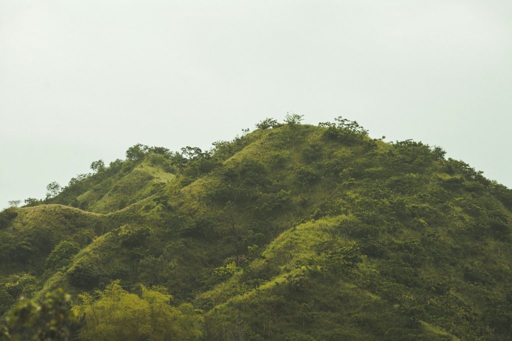 Green mountain during daytime