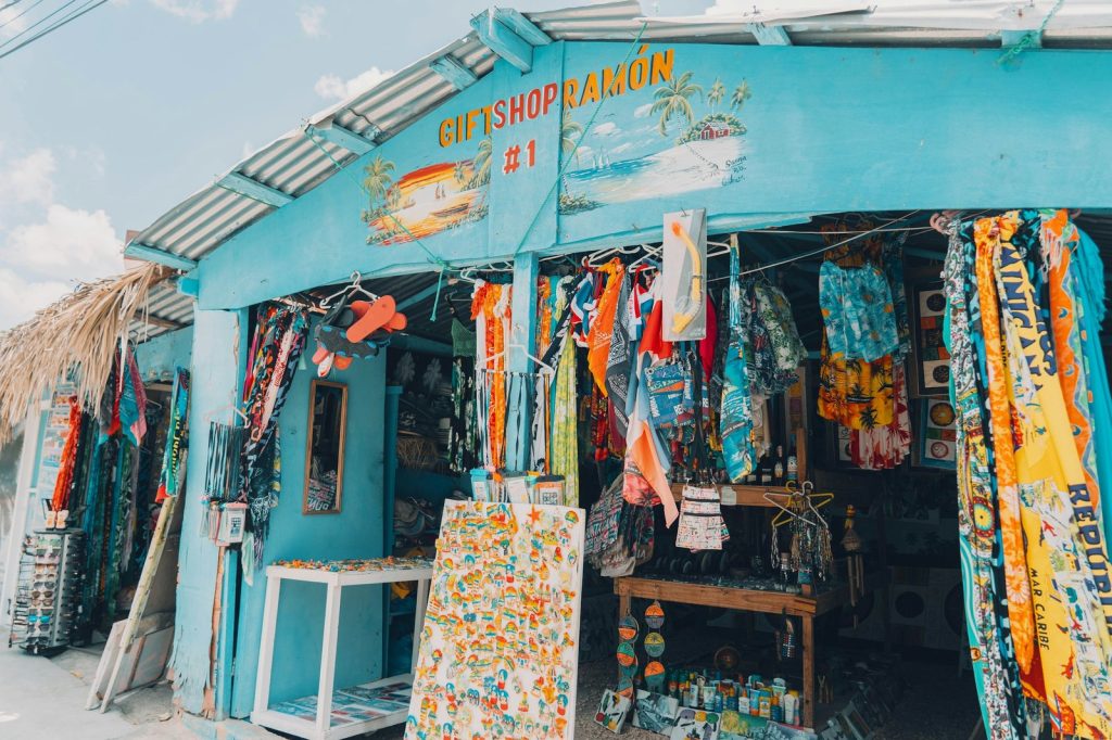 A blue store with lots of items on display