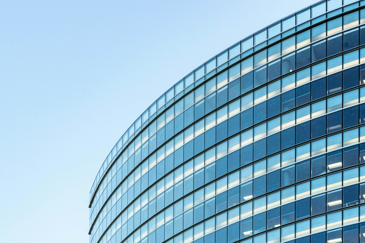 White and blue glass walled building
