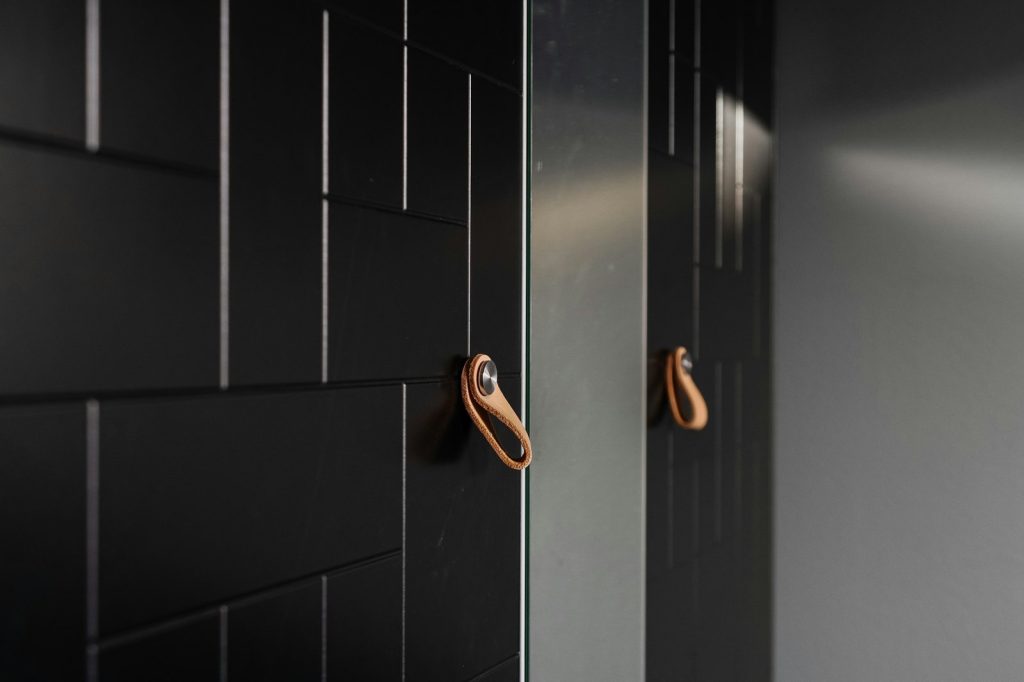 A close up of a door with a handle on it