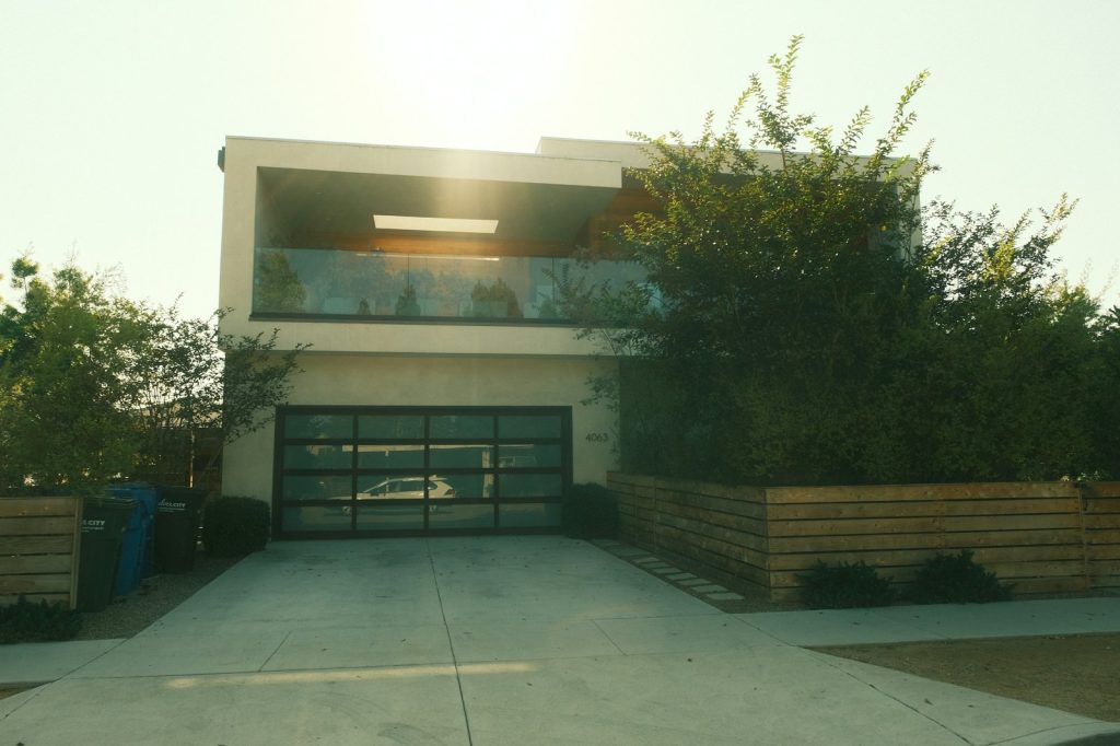 Modern house with a garage and balcony