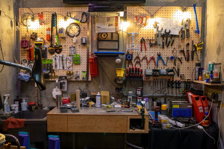 Workshop wall with tools and workbench