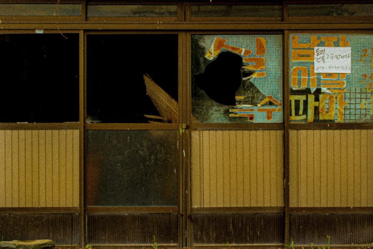 brown wooden framed glass window