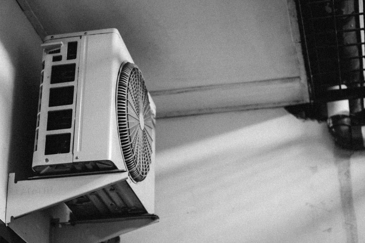 A wall-mounted air conditioner unit, the appliance that energy-efficient glass actually saves money on