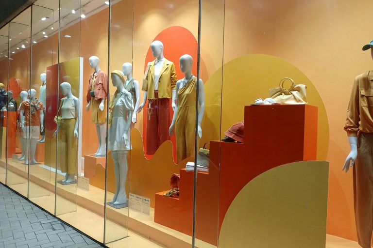 a display of mannequins in a store window