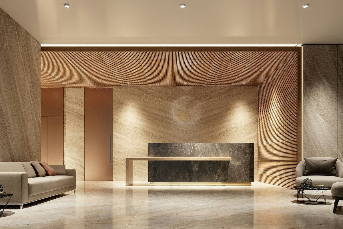 A modern office lobby with reception desk, illustrating the typical Jamaican commercial office lobby design