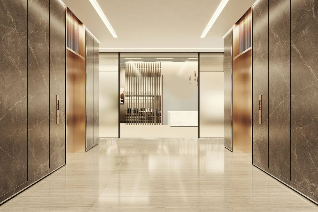 Modern elevator lobby with marble and glass accents