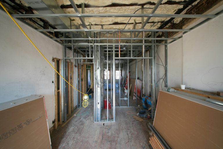 Interior construction with metal framing and drywall panels