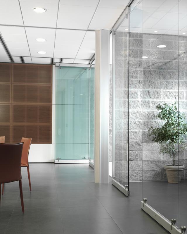 Modern office interior with glass partition system