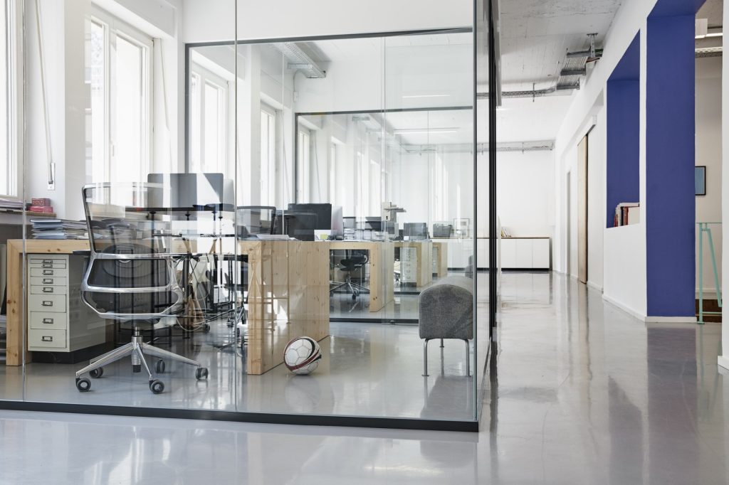 Glass office partition system with clean aluminum profiles