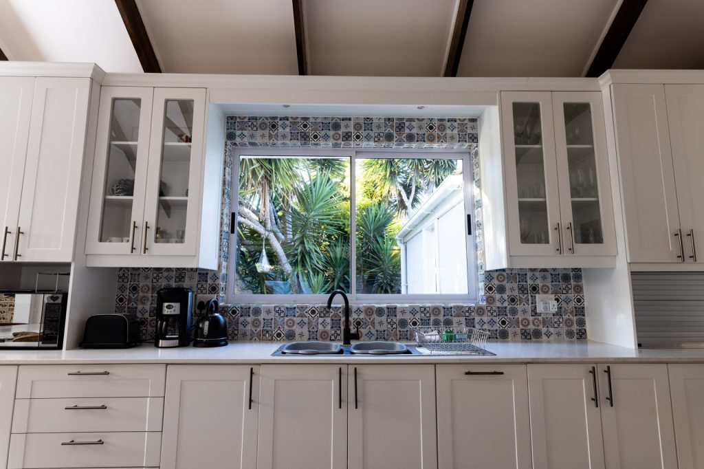 Aluminum-framed sliding windows in a modern installation